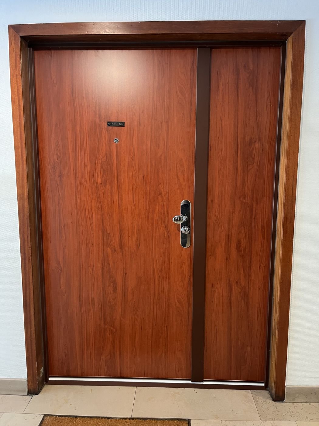 Building entrance door serviced — Paris