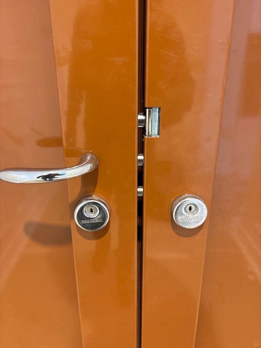 Multipoint locks on a reinforced double door